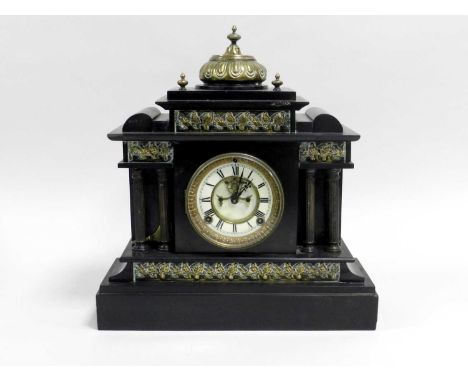 An Ansonia black slate mantel clock, of architectural form with brass cast mounts, the eight day movement with open escapemen