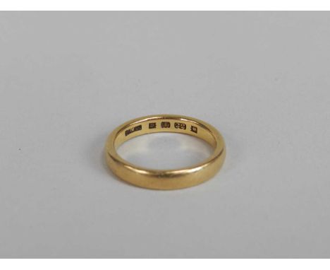 A 22ct gold plain polished wedding band, hallmarked London 1935, ring size L, weight approx 5.1g