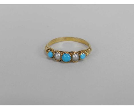 A five stone turquoise and pearl ring, designed as three cabochon turquoise interspersed with two split pearls, all set in ye