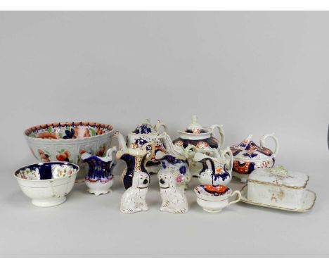 A good quantity of 'Gaudy Welsh' tablewares 19th century including three teapots and covers, twin-handled sucrier and cover, 