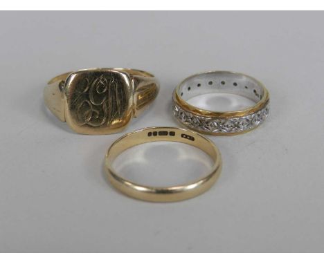 A 9ct gold signet ring, size U 1/2, together with together with a 9ct gold band, size O and an 18ct gold diamond set band, to