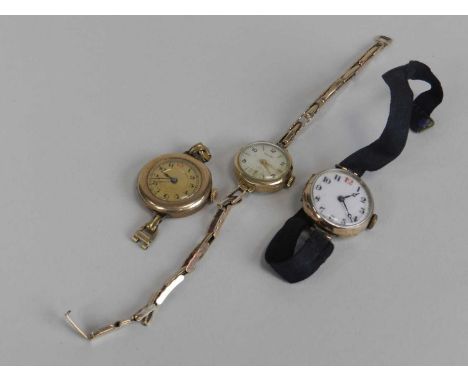 A 9ct gold Lady's Rotary bracelet watch, together with a yellow metal wristwatch with moire ribbon strap and a further yellow