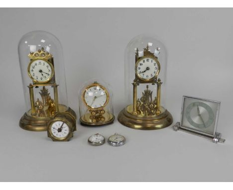 Five various mantel clocks, first half 20th Century, including German rotary pendulum type with glass domes. (5)