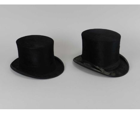 Two silk top hats, the first Battersby &amp; Co., 51.5cm approx., the second Cuthbertson, 53cm approx.. (2)