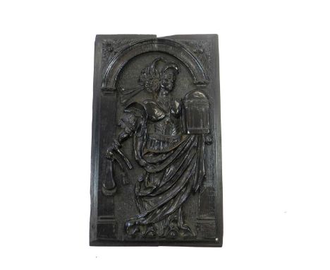 A carved oak panel, 17th/18th century, of rectangular outline and carved in relief with a lady holding a birdcage beneath an 