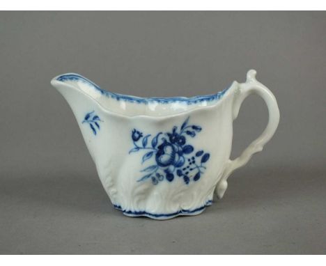 A Caughley Chelsea ewer circa 1786-91 painted in blue with the 'Simple Posy' pattern, an associated blue line around the base