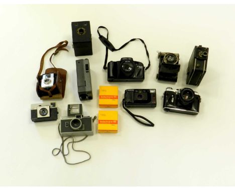 A collection of cameras, including a Kodak Popular Brownie in a canvas case, 12cm wide; a Compur camera, F.Deckel, Munchen a/