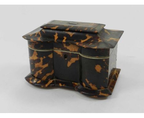 A 19th century tortoiseshell tea caddy, of casket form, the two-division interior with tortoiseshell lined covers, 20cm wide.