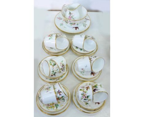 A STAFFORDSHIRE PORCELAIN TEA SERVICE, PAINTED WITH BIRDS AND BLOSSOM OR FRUITING BOUGHS, GILT RIM, C1870