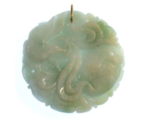 A CHINESE CARVED JADE PENDANT, 5CM D