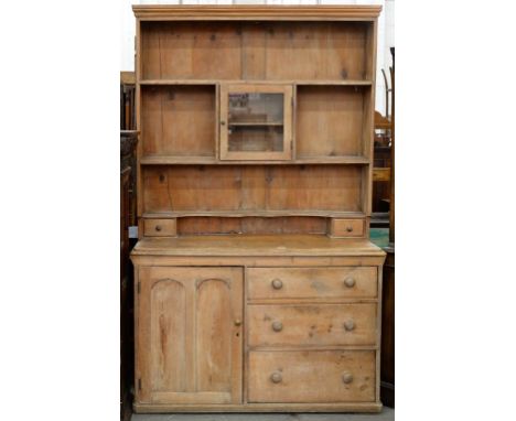 A VICTORIAN WAXED PINE DRESSER AND RACK WITH A SEPARATE STAINED PINE SHELF 195 X 123CM