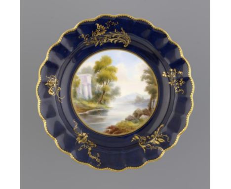 A ROYAL WORCESTER GROS BLEU GROUND PLATE, 1912 painted by G Johnson, signed, in the manner of Corot with a romantic landscape