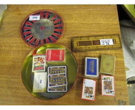  Sale Item:    ROULETTE TIN PLAYING CARDS & CRIBBAGE BOARD (AF)  Vat Status:   No Vat   Buyers Premium:  This lot is subject 