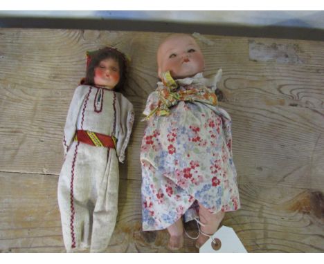  Sale Item:    GERMAN PORCELAIN HEADED DOLL & 1 OTHER (AF)  Vat Status:   No Vat   Buyers Premium:  This lot is subject to a 