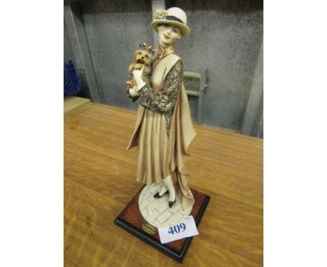  Sale Item:    SIGNED GUSEPPE ARMANI FIGURINE   Vat Status:   No Vat   Buyers Premium:  This lot is subject to a Buyers Premi