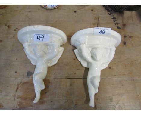  Sale Item:    PAIR WHITE POOLE BRACKETS   Vat Status:   No Vat   Buyers Premium:  This lot is subject to a Buyers Premium of