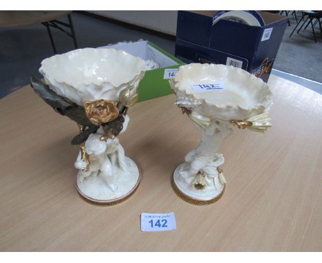  Sale Item:    2 MOORES CHERUB TAZZAS (AF)   Vat Status:   No Vat   Buyers Premium:  This lot is subject to a Buyers Premium 