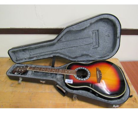  Sale Item:    CASED ENCORE ELECTRIC GUITAR- NO LEAD (AF)  Vat Status:   No Vat   Buyers Premium:  This lot is subject to a B