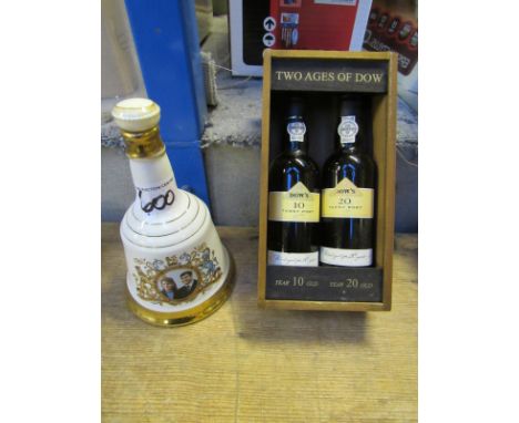  Sale Item:    2 BOXED BOTTLES PORT DOWS 37.5CL & BELLS WHISKY DECANTER  Vat Status:   No Vat   Buyers Premium:  This lot is 