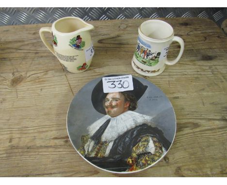  Sale Item:    2 WIDECOMBE FAIR JUGS & LAUGHING CAVALIER PLATE (AF)  Vat Status:   No Vat   Buyers Premium:  This lot is subj