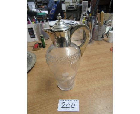  Sale Item:    SMALL CLARET JUG WITH SILVER MOUNTS  Vat Status:   No Vat   Buyers Premium:  This lot is subject to a Buyers P