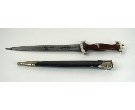 A Nazi Germany SA dagger, 20th Century
With straight 22cm double edged blade, marked 'Alles Fur Deutschland', with wooden gri