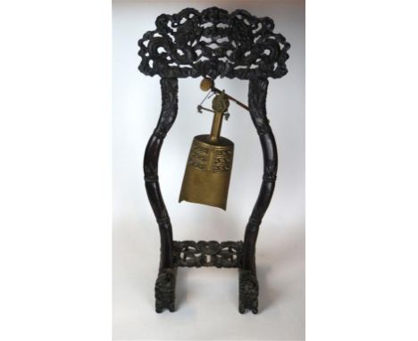 A Chinese carved hardwood temple bell, Late Qing Dynasty (1664-1912)/Republic Period
The carved hardwood frame with pediment 