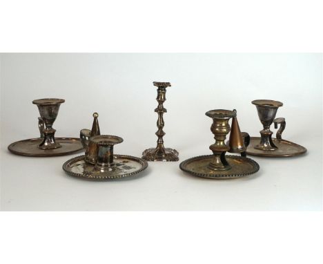 A collection of four Sheffield plate, Georgian and later chamber sticks
To include a pair of oval form examples, two examples
