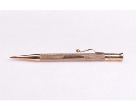 A 9ct gold propelling pencil, mid 20th Century
With engine turned barrel and personal inscription to rectangular cartouche, s