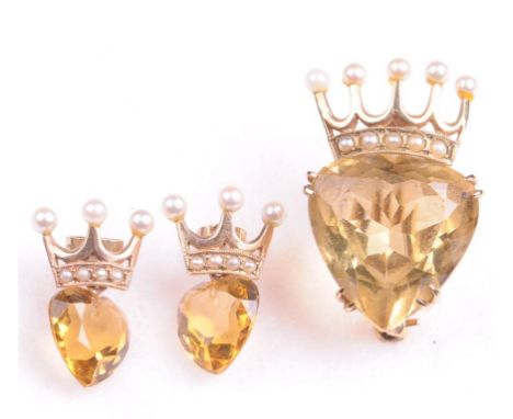 A citrine and seed pearl set brooch and earrings
The brooch having a substantial heart cut citrine with seed pearl set  crown