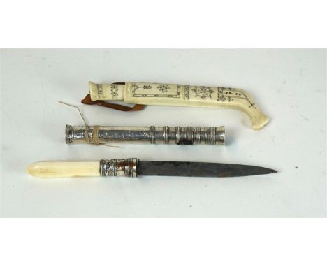 A Small Burmese Dah, late 19th Century 
The straight single edged blade, with applied bone and white metal beaded grip, with 