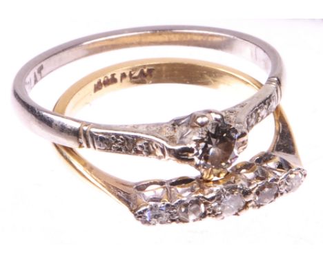 Two diamond set dress rings
The first set with a single old cut diamond to decorative shoulders and plain band, estimated dia