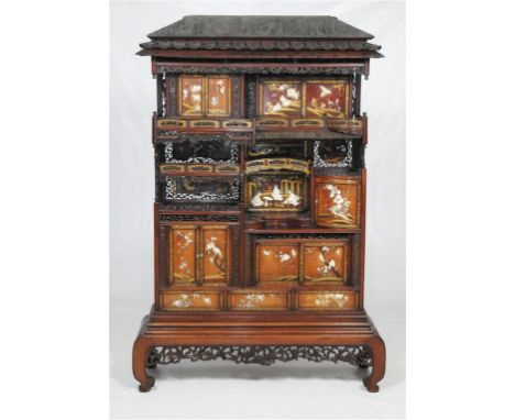 An exquisite Japanese inlaid ivory and shibayama Shodana cabinet, Meiji Period (1868-1912)
The cabinet rising from four swept