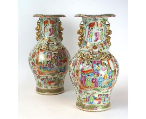 A fine pair of Chinese Canton famille rose vases, Circa 1880-1910
Each of baluster form and terminating at an everted scallop
