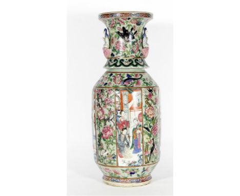 A Chinese celadon-ground Canton famille rose vase, 19th Century 
Of baluster form, the rounded body with over-hanging ruyi pa