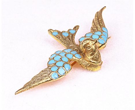 A gold and turquoise enamel brooch
In the form of a bird in flight, with textured feathered wings and turquoise enamel highli
