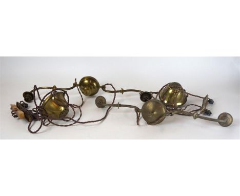 A pair of early 20th Century pulley 'rise and fall' ceiling light fittings
The twin scroll and reeded branches extending from