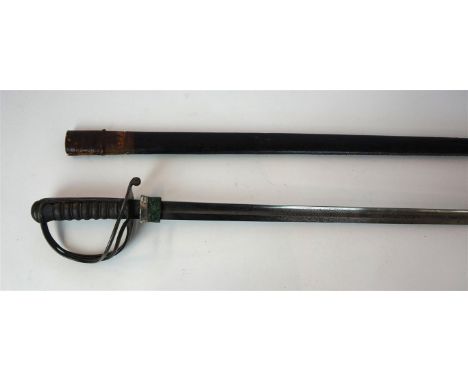 A Queen Victoria British Infantry Officer's Sword
The 87cm single edged, single fullered blade with acid etched decoration an