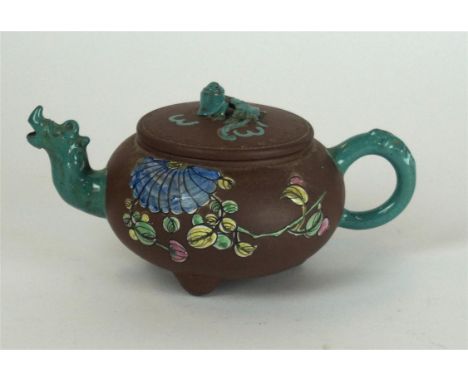 A Chinese Yixing style teapot and cover, in the manner of Cai Shaofeng, Qing Dynasty/Republic Period
Of globular form, mounte