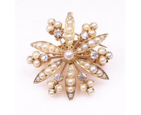 A 15ct gold split pearl and diamond set floral brooch, early 20th Century
The split pearls on alternating petal and trefoil d