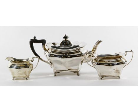 An Edward VII hallmarked silver Art Nouveau three piece tea service
Comprising teapot, twin handled sugar bowl, milk jug, eac