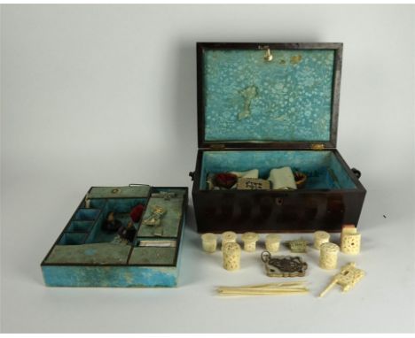 A William IV mother of pearl and pewter inlaid rosewood sewing box, together with sewing accoutrements
The hinged lid enclosi