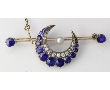 A late 19th century sapphire and diamond set crescent bar brooch
The central crescent set with graduated oval cut sapphires t