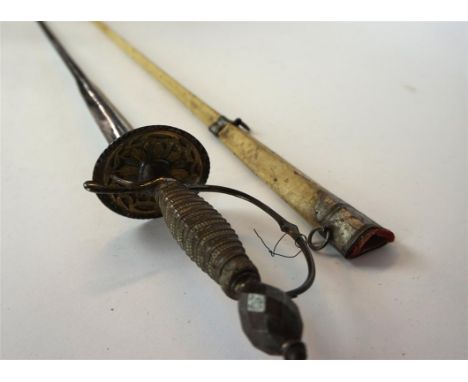 An English small sword, late 18th/early 19th Century
The 81cm colichemarde triangular blade with foliate decoration, plain cu