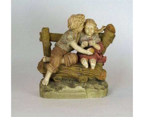 A 19th Century Robinson & Leadbeater Parian figure group entitled 'Sweets to the Sweet'
Depicting a boy and girl, holding swe