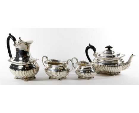 Edward VII hallmarked silver four piece tea service
Comprising teapot, hot water jug, twin handled sugar bowl, milk jug, each