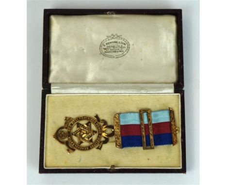 A 9ct Gold Royal Arch Chapter breast Jewel
Suspended on a light blue, red and dark blue ribbon, produced by G. Kenning & Son,
