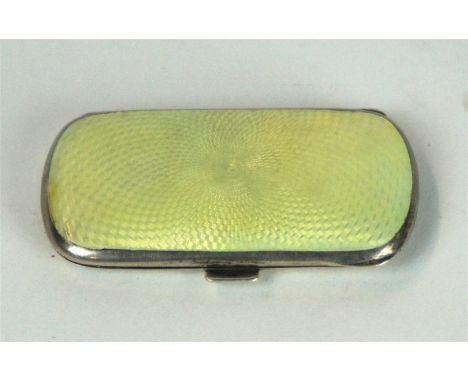 An Art Deco imported silver and enamel cigarette case
With yellow engine turned enamel decoration, length 7.5cm.