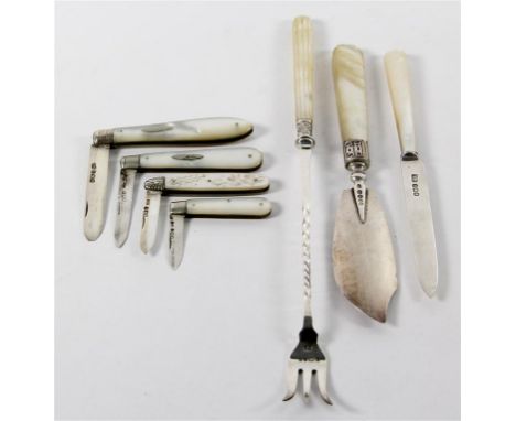 A collection of Victorian and later hallmarked silver flatware 
With mother of pearl handle pickle fork, butter knife, bread 