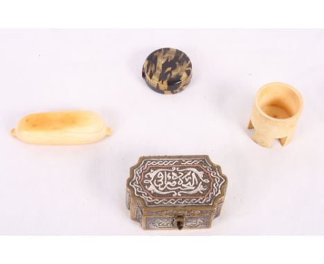 A silver and copper inlaid Cairoware brass box, a Chinese engraved tortoiseshell compact and two ivory items